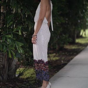 Stripe jumpsuit open in the back size SMALL